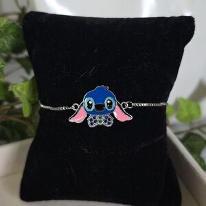 Silver Stainless Steel Bolo Adjustable Pull Bracelet with Stitch Charm